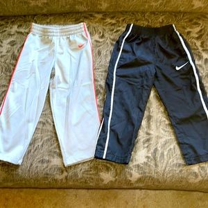 Two pair of toddler boys Nike athletic pants.
